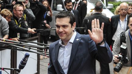 Le Premier ministre grec, Alexis Tsipras, le 12 juillet 2015 &agrave; Bruxelles (Belgique). (ARIS OIKONOMOU / SOOC / AFP)