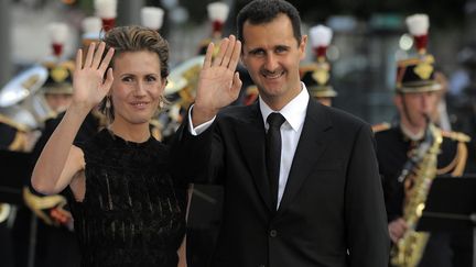 Asma et Bachar Al-Assad, le 13 juillet 2008 &agrave; Paris. (BELGA / AFP)