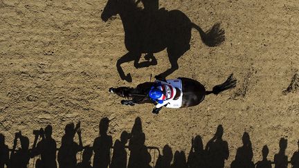 Le photographe anglais remporte le premier prix dans la catégorie «Olympics Feature» lors du concours annuel The Best of Photojournalism, organisé par le National Press Photographers Association. Trois autres reporters-photographes ont également été primés : Roberto Schmidt, Karim Sahib et Cesar Manso. (Adrian Dennis)