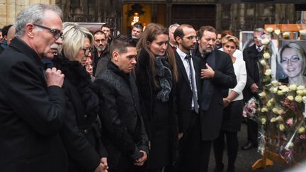 Jonathann Daval, Stéphanie et Grégory Gay, lors des funérailles d'Alexia Daval, le 8 novembre 2017 à Gray (Haute-Saône). (SEBASTIEN BOZON / AFP)