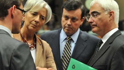 Les ministres des Finances, Jyrki Katainen (Fin), Christine Lagarde (Fr), Brian Lenihan (Ir) et Alistair Darling (GB) (AFP PHOTO / GEORGES GOBET)