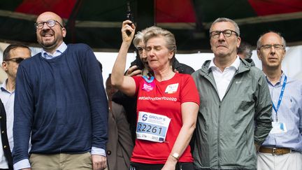 Le Premier ministre belge Charles Michel, la princesse Astrid et le maire de Bruxelles, Yvan Mayeur, au départ des 20 km de Bruxelles, le 28 mai 2017. (LAURIE DIEFFEMBACQ / BELGA MAG / AFP)