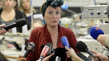 Muriel Pernin, fondatrice et dirigeante des Ateli&egrave;res, lors d'une conf&eacute;rence de presse le 6 mars 2014, &agrave; Villeubanne pr&egrave;s de Lyon (Rh&ocirc;ne). (JEAN-PHILIPPE KSIAZEK / AFP)