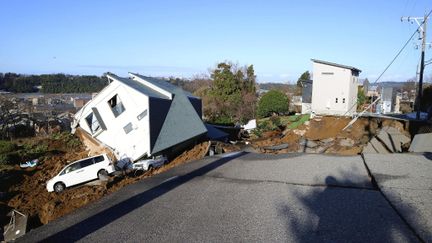 Collapsed houses in Kanazawa, Japan, January 2, 2024. (YUMA IKESHITA / YOMIURI / AFP)