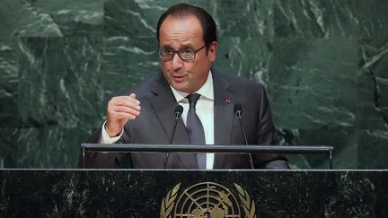 Fran&ccedil;ois Hollande &agrave; la tribune de l'ONU, le 28 septembre 2015 pour l'Assembl&eacute;e g&eacute;n&eacute;rale des 70 ans de l'instance, &agrave; New York. (JOHN MOORE / GETTY IMAGES NORTH AMERICA  / AFP)