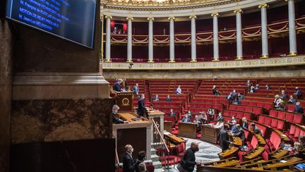 Le ministre de l'Intérieur Gerald Darmanin à la tribune, le 1er février 2021, lors de l'ouverture du débat à l'Assemblée Nationale sur le projet de loi sur le respect des principes republicains. (MAXPPP)