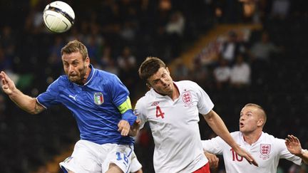 Italiens et Anglais vont se retrouver au Mondial 2014 (FABRICE COFFRINI / AFP)