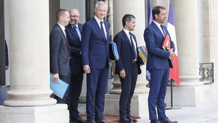 Plusieurs membres du gouvernement sortent du premier conseil des ministres, le 22 août 2018.&nbsp; (LEON TANGUY / MAXPPP)