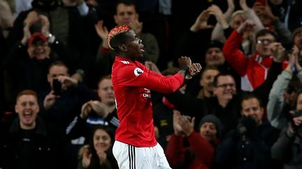 Le joueur de Manchester United Paul Pogba célèbre son but, le 18 novembre 2017, à Manchester. (ANDREW YATES / REUTERS)