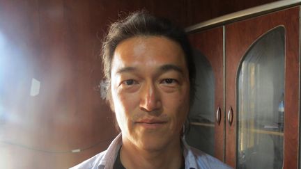 Kenji Goto, l'otage japonais ex&eacute;cut&eacute; par le groupe Etat islamique, sur une photo dat&eacute;e du 24 octobre 2014. (AHMED MUHAMMED ALI / ANADOLU AGENCY / AFP)