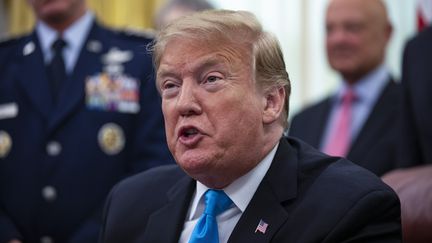 Le président américain Donald Trump, le 19 février 2019, dans le Bureau ovale de la Maison Blanche à Washington (Etats-Unis). (ALEX EDELMAN / CONSOLIDATED NEWS PHOTOS / AFP)