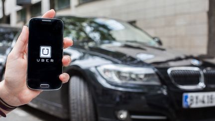 La plateforme de réservation de voiture avec chauffeur (VTC) Uber, a annoncé la mise en place de nouvelles protections pour ses chauffeurs et coursiers en Europe, le 23 mai 2018. (PIERRE GAUTHERON / HANS LUCAS)