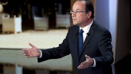 François Hollande annonce un taux d'imposition de 75% pour les hauts revenus (FRED DUFOUR / POOL / AFP)