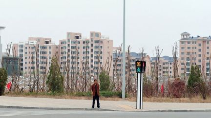 Proche d’Ordos, a été construit la mégapole Kangbashi, symbole des villes fantômes qui jaillissent actuellement du sol chinois. (AFP PHOTO/Frederic J. BROWN)