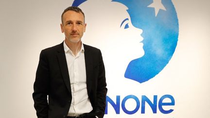 Emmanuel Faber, lors d'une conférence de presse du groupe Danone, le 16 février 2018.&nbsp; (PATRICK KOVARIK / AFP)