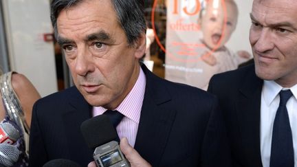 L'ex-Premier ministre Fran&ccedil;ois Fillon lors d'une visite &agrave; Lyon pour soutenir le candidat UMP aux municipales, Michel Havard, le 5 septembre 2013 (PHILIPPE DESMAZES / AFP)