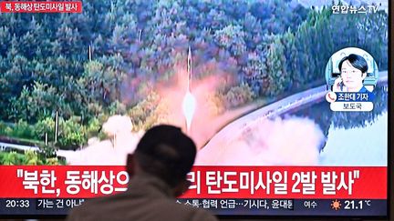 A man watches a television program showing images of a North Korean missile launch in Seoul, South Korea, on June 15, 2023. (ANTHONY WALLACE / AFP)