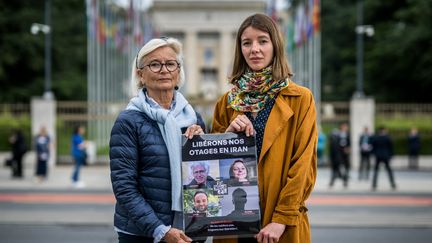 On the left, Sylvie Arnaud, the mother of Louis Arnaud, returned to France on Thursday, on the right Noémie Kohler, the sister of Cécile Kohler, still detained in Iran.  Photo taken on May 27, 2024 in Geneva, Switzerland.  (FABRICE COFFRINI / AFP)