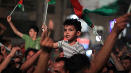 A Ramallah, apr&egrave;s la victoire de la s&eacute;lection palestinienne, le 30 mai 2014. (ABBAS MOMANI / AFP)