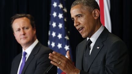 David Cameron et Barack Obama, le 5 juin 2014 &agrave; Bruxelles (Belgique). (KEVIN LAMARQUE / REUTERS)