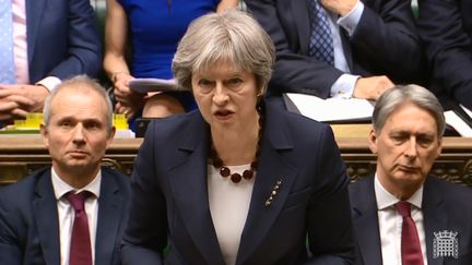 Theresa May s'exprime devant le Parlement britannique, à Londres le 14 mars 2018. (HO / PRU / AFP)