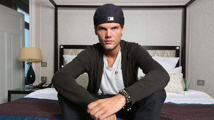 Le DJ suédois Avicii pose à Paris, le 10 septembre 2013. (MAXPPP)