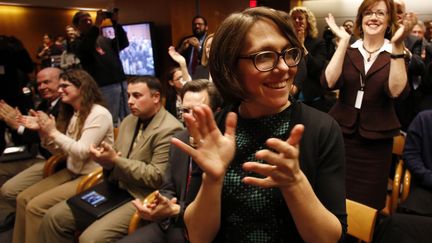 Des partisans de la neutralit&eacute; de la toile, pr&eacute;sents dans le public, saluent la d&eacute;cision de la FCC, le 26 f&eacute;vrier 2015, &agrave; Washington (Etats-Unis). (YURI GRIPAS / REUTERS)