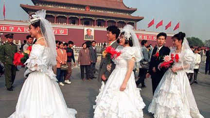 Les chinois accordent une grand place au au mariage, comme ici place Tianamen à Pékin (Reuters/ Will Burgess)