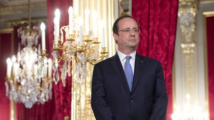 Le pr&eacute;sident de la R&eacute;publique Fran&ccedil;ois Hollande durant une c&eacute;r&eacute;monie au palais de l'Elys&eacute;e, &agrave; Paris, le 10 juin 2014. (ALAIN JOCARD / AFP)