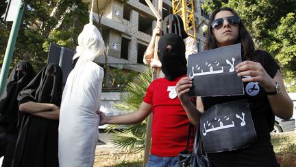 Des activistes d&eacute;noncent les &eacute;x&eacute;cutions en Arabie Saoudite devant l'ambassade &agrave; Beyrouth, le 1er avril 2010. (BILAL HUSSEIN / AP/ SIPA)