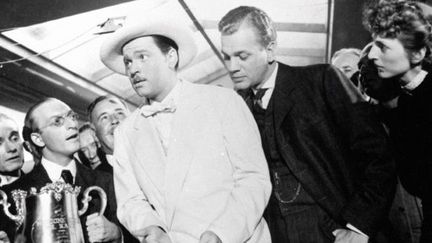 Orson Welles (en blanc) et Joseph Cotten (à sa gauche) dans &quot;Citizen Kane&quot; (1941)
 (AFP / Photo12.com Collecion cinéma)