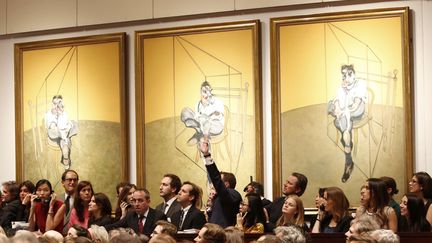 "Trois études de Lucian Freud", un triptyque de Francis Bacon datant de 1969, a été vendu 142,4 millions de dollars (105,9 millions d'euros) chez Christie's, à New York (Etats-Unis), le 13 novembre 2013. (AP / SIPA)