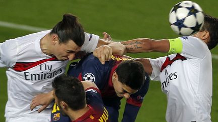 Parisiens et Barcelonais au Camp Nou, le 10 avril 2013 (JOSE JORDAN / AFP)