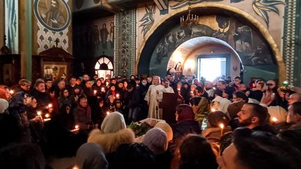 La dépouille de l'opposant russe Alexeï Navalny a été inhumée le 1er mars 2024 dans un cimetière de Moscou à l'issue d'une brève cérémonie religieuse à sa mémoire
dans une église de la capitale russe. (- / AFP)