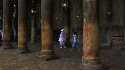 Des pèlerins à l&#039;Eglise de la Nativité à Bethléem (Territoires palestiniens), juin 2012
 (Musa al-Shaer / AFP)