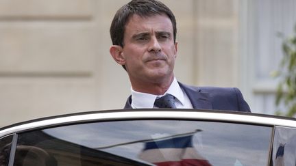 Le Premier ministre, Manuel Valls, &agrave; la sortie de l'Elys&eacute;e, le 24 juillet 2014. (ETIENNE LAURENT / MAXPPP)