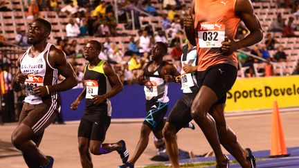 Le patron du sprint mondial, Usain Bolt, à l'arrivée aux sélections de Jamaïque (RICARDO MAKYN / AFP)