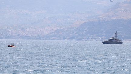 An Italian coastguard ship, off the coast of Palermo (Italy), on August 19, 2024. (ALBERTO LO BIANCO / ANADOLU / AFP)