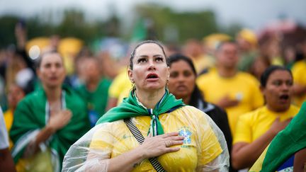 Des partisans de Jair Bolsonaro participent à une manifestation contre les résultats du second tour de l'élection présidentielle, devant le siège de l'armée à Brasilia, le 15 novembre 2022. (SERGIO LIMA / AFP)