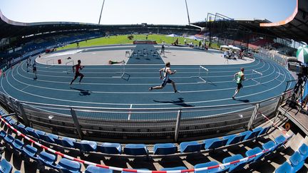 Compétition d'athlétisme devant des tribunes vides. (SWEN PF?RTNER / DPA)