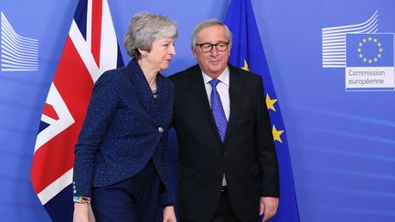 Theresa May et Jean-Claude Juncker à Bruxelles, le 7 février 2019. (DURSUN AYDEMIR / ANADOLU AGENCY / AFP)