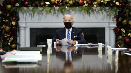 Joe Biden s'exprime depuis la Maison Blanche à Washington (Etats-Unis), le 16 décembre 2021. (DREW ANGERER / GETTY IMAGES NORTH AMERICA / AFP)