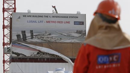 Un chantier mené par Qatari Diar Vinci Construction (QDVC) à Doha (Qatar) en mars 2015. (KARIM JAAAFAR / AL-WATAN DOHA / AFP)