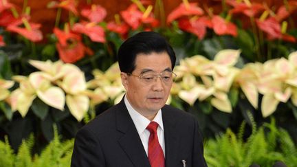 Hu Jintao,&nbsp;ouvrant officiellement le XVIIIe Congr&egrave;s du Parti communiste chinois &agrave; P&eacute;kin (Chine), jeudi 8 novembre. (GOH CHAI HIN / AFP)