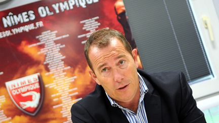 L'ancien pr&eacute;sident du N&icirc;mes Olympique, Jean-Marc Conrad, le 7 juillet 2014 &agrave; N&icirc;mes (Gard). ( AFP )