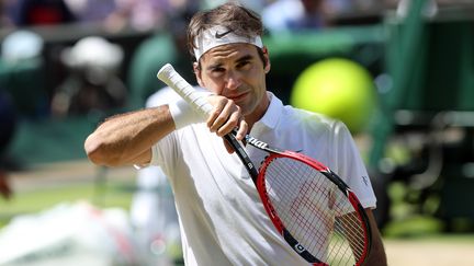 L'ancien N.1 mondial Roger Federer en souffrance (DAVE SHOPLAND / BACKPAGE IMAGES LTD)