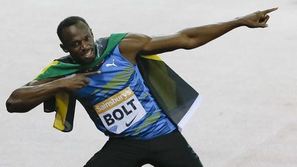 Le sprinter jama&iuml;cain Usain Bolt apr&egrave;s sa victoire au meeting de Londres, le 24 juillet 2015. (KIRSTY WIGGLESWORTH / AP / SIPA)