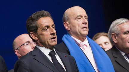 &nbsp; (Nicolas Sarkozy et Alain Juppé, en février 2015, au conseil national de l'UMP © MAXPPP)