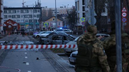 Vehicles are damaged after a bombing, in Belgorod (Russia), December 30, 2023. (EMIL LEEGUNOV / ANADOLU / AFP)