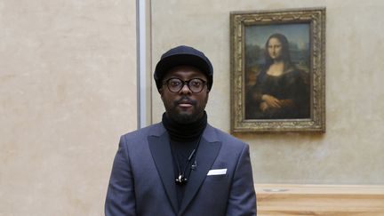 Will I am devant la Joconde, avril 2016
 (FRANCOIS GUILLOT / AFP)